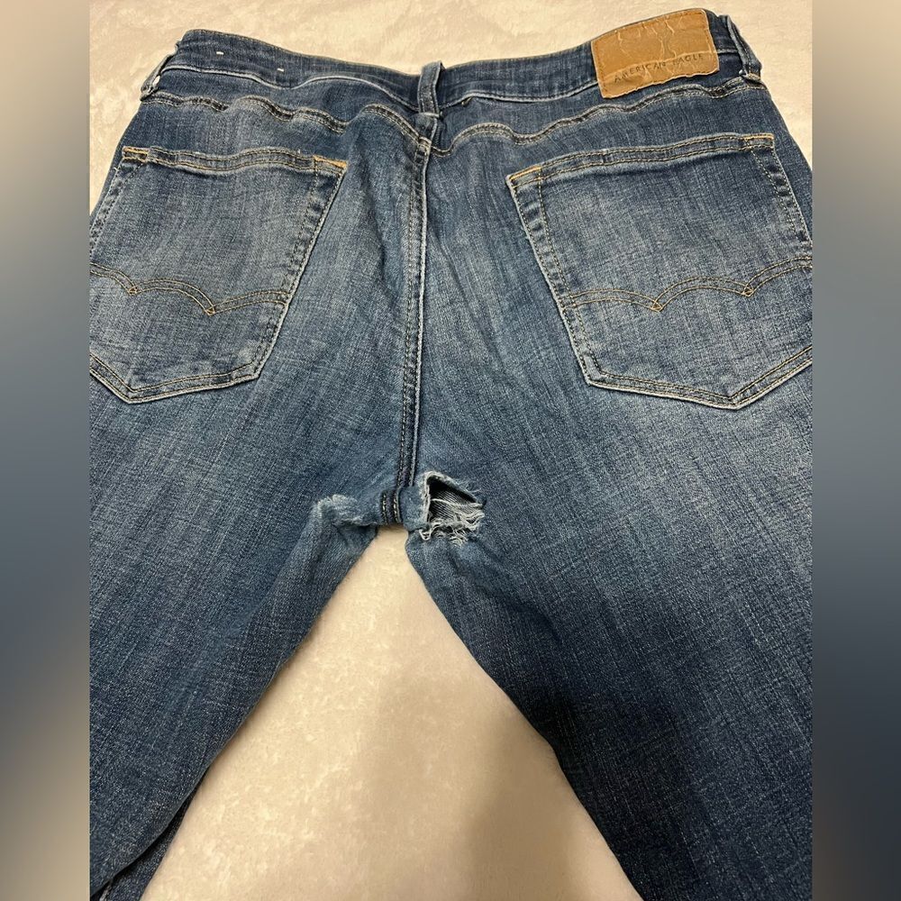 American eagle men's jeans 34x30, please note the hole in the crotch. Pre owned